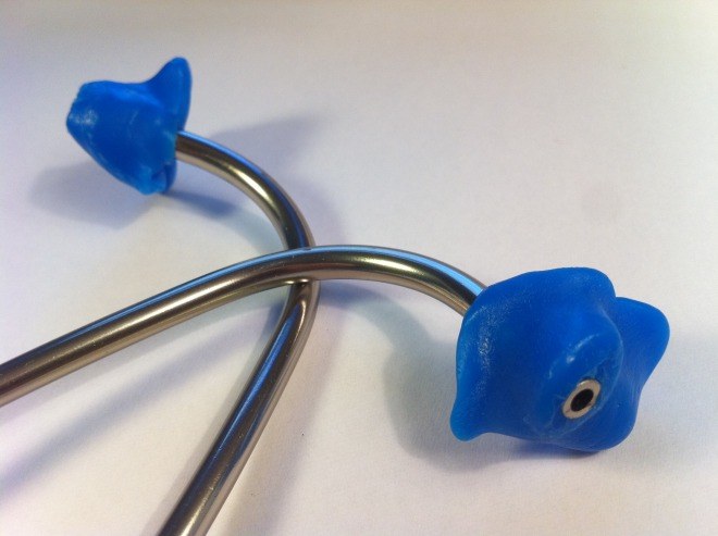 Blue moulded stethoscope earpieces.